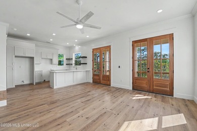 Enjoy coastal living on the beautiful Biloxi Back Bay in this - photo 5