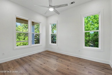 Enjoy coastal living on the beautiful Biloxi Back Bay in this - photo 10