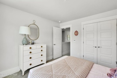 The Norman townhome is a two-story residence with 4 bedrooms and - photo 29