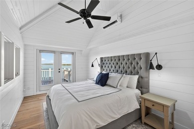 Water Wings cottage is waterfront, two-stories with Master on - photo 25