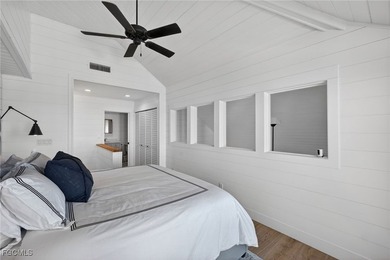 Water Wings cottage is waterfront, two-stories with Master on - photo 27