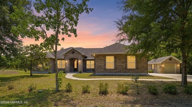 Tucked away on a peaceful private road, this custom-built full - photo 1