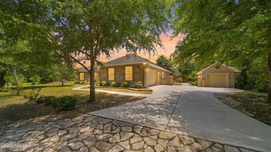 Tucked away on a peaceful private road, this custom-built full - photo 3