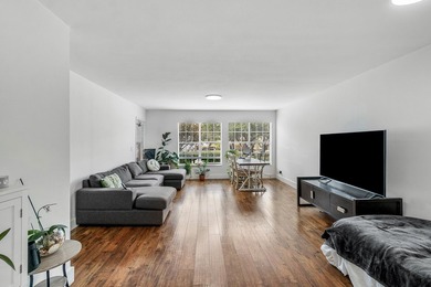 Beautifully renovated 2-bedroom, 2-bath end-unit condo in the - photo 1