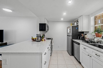 Beautifully renovated 2-bedroom, 2-bath end-unit condo in the - photo 10