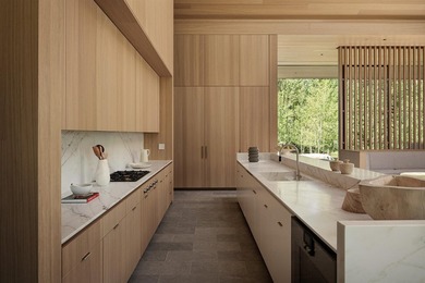 River Lodge, a new riverfront estate set on 2.1 acres along the - photo 16