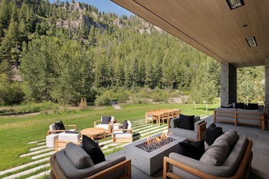 River Lodge, a new riverfront estate set on 2.1 acres along the - photo 18