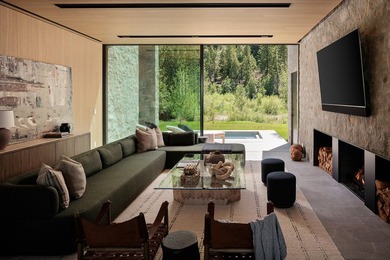 River Lodge, a new riverfront estate set on 2.1 acres along the - photo 19
