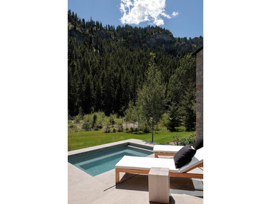 River Lodge, a new riverfront estate set on 2.1 acres along the - photo 22