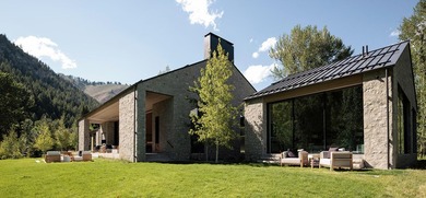 River Lodge, a new riverfront estate set on 2.1 acres along the - photo 49