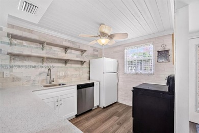 Beautiful first-floor 1-bedroom, 1.5 bath condo in the active - photo 1