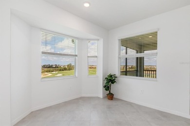 Virtually Staged. WOW! TOP FLOOR, END UNIT CONDO WITH GOLF - photo 8