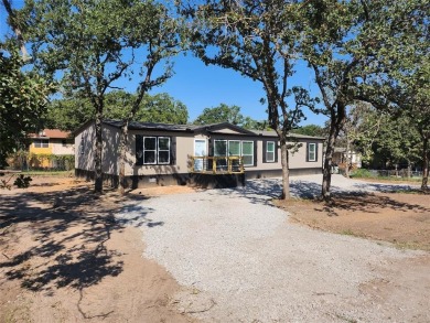 Lake Home For Sale in Pelican Bay, Texas