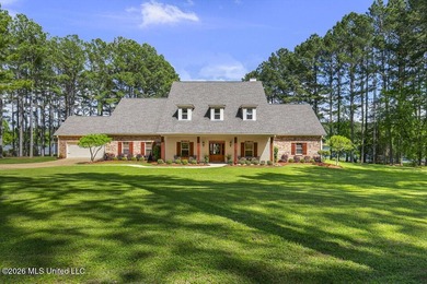 Welcome to this exceptional waterfront home located in the gated - photo 1