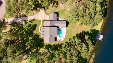 Welcome to this exceptional waterfront home located in the gated - photo 2