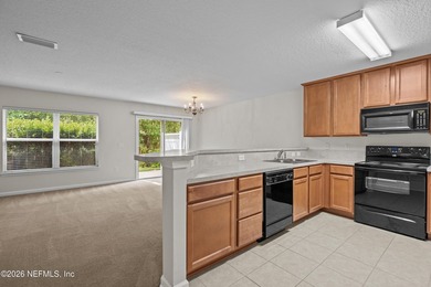 Discover low-maintenance living in this well-maintained - photo 8