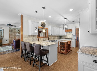 Welcome to this exceptional waterfront home located in the gated - photo 9