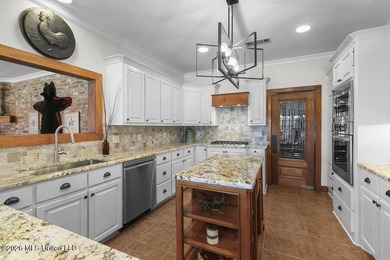 Welcome to this exceptional waterfront home located in the gated - photo 10
