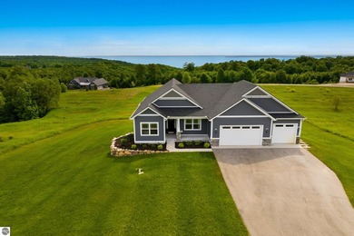 Perched above West Grand Traverse Bay with sweeping water views - photo 1