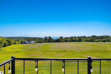 Perched above West Grand Traverse Bay with sweeping water views - photo 3