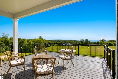 Perched above West Grand Traverse Bay with sweeping water views - photo 4