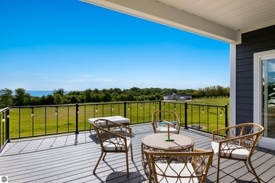 Perched above West Grand Traverse Bay with sweeping water views - photo 5