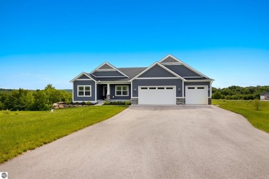 Perched above West Grand Traverse Bay with sweeping water views - photo 7