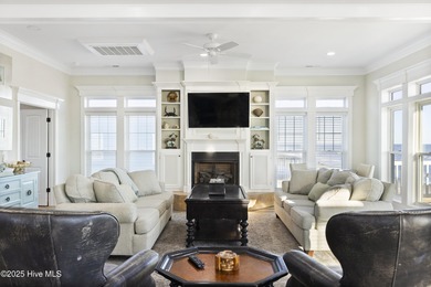 This 7-bedroom, 7-bath oceanfront home on North Topsail Beach is