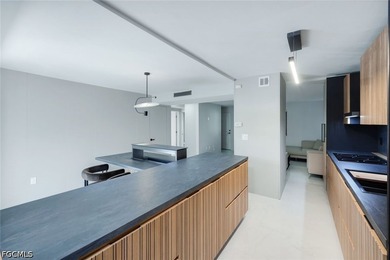 Exquisitely remodeled second-floor condominium in the highly - photo 14