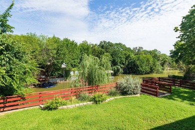 WATERFRONT! Nestled on a private lot along a peaceful canal of - photo 31