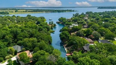 WATERFRONT! Nestled on a private lot along a peaceful canal of - photo 38