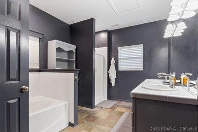 Enjoy this beautifully updated cottage at one of the best golf - photo 11