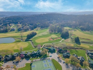 Enjoy this beautifully updated cottage at one of the best golf - photo 17