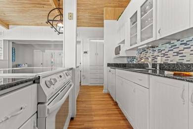 Experience refined lakefront living in this rare waterfront - photo 11