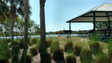 Across from the water located in the very special community of - photo 8