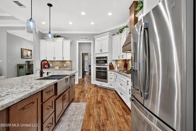 Custom-built and only 4 years young, this exceptional 5-bedroom - photo 16