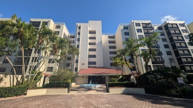Enjoy beautiful lake views from this bright and inviting - photo 1