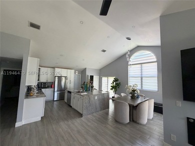 Beautiful direct water and golf course views set the stage for - photo 3