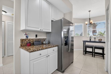 Stunning 2BR/2BA deluxe condo in the heart of SE Boca! Nestled - photo 15