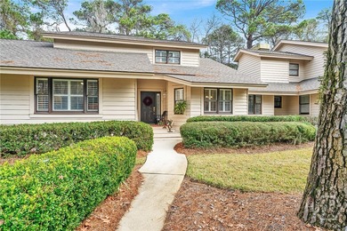 Professionally and tastefully renovated, this light-filled & - photo 2