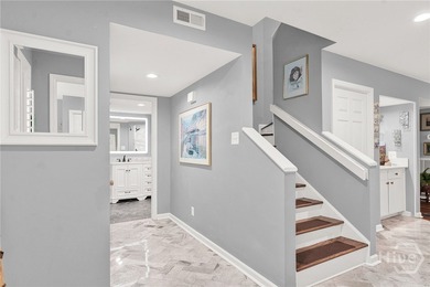 Professionally and tastefully renovated, this light-filled & - photo 5