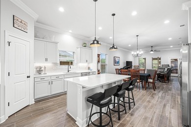 Welcome to 101 Hydrangea Boulevard, a beautifully designed - photo 11
