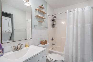 This top-floor remodeled, 1-bedroom, 1-bath condo offers a - photo 14