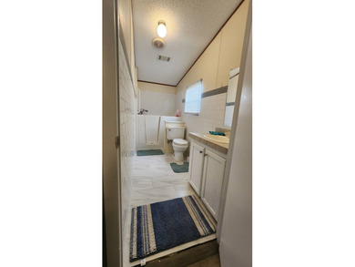 Manufactured home on lease land with lot rent. This charming - photo 8