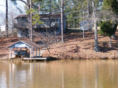 This is the old Corley Realty office. It never has been a house - Lake Home For Sale in Eatonton, Georgia