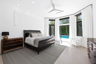 Set on a quiet cul-de-sac within the prestigious enclave of Long - photo 12