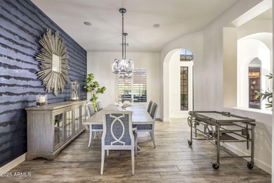 Set on an elevated, private flag lot in the coveted N Scottsdale