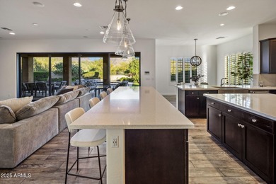 Set on an elevated, private flag lot in the coveted N Scottsdale