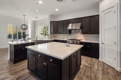 Set on an elevated, private flag lot in the coveted N Scottsdale