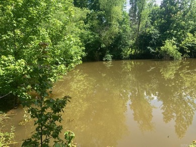 Approximately 64 wooded acres with county road frontage - photo 12